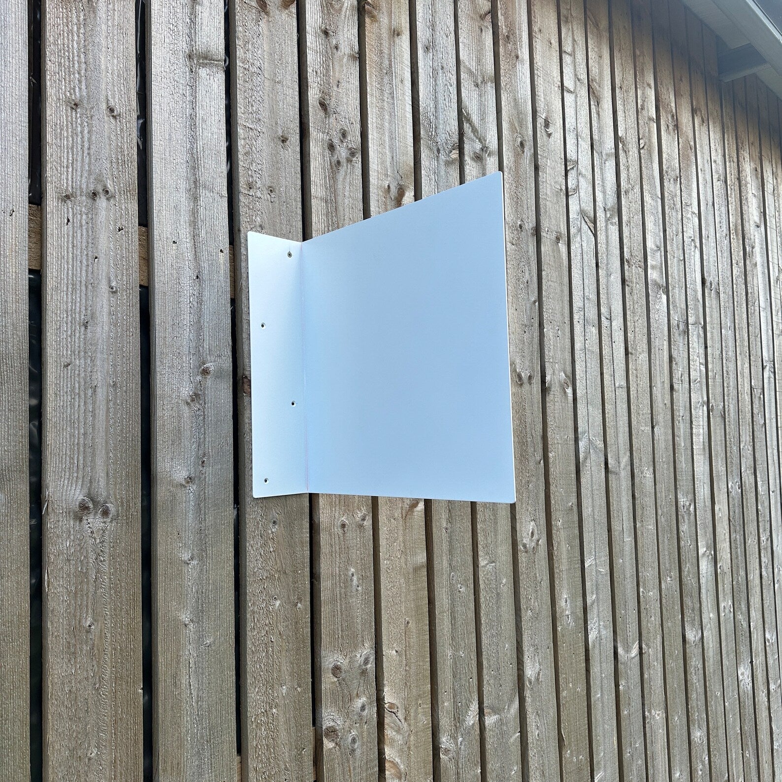 White Projecting Blade Sign